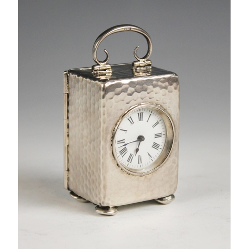 64 - A late Victorian miniature silver travelling clock, Henry Matthews, Birmingham 1900, the circular wh... 