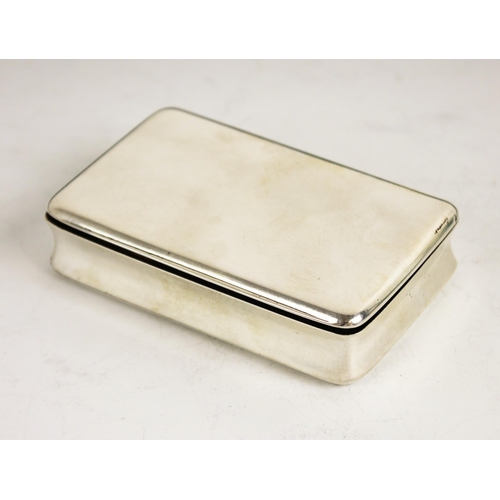 65 - A George IV silver snuff box, possibly Thomas Spicer, Birmingham 1825, of rectangular waisted form, ... 