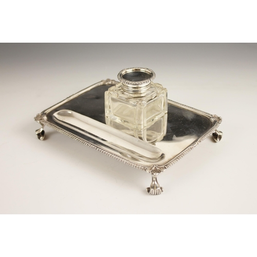 101 - A George V silver cut glass desk stand, Mappin & Webb, Sheffield 1918, the rectangular base with scr... 