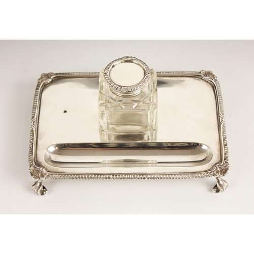 101 - A George V silver cut glass desk stand, Mappin & Webb, Sheffield 1918, the rectangular base with scr... 