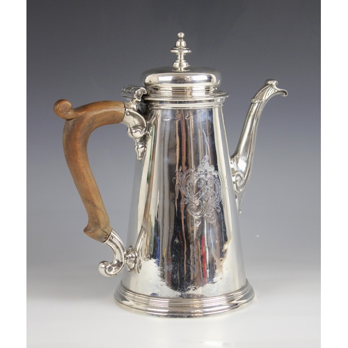 94 - A George II silver coffee pot, London 1745 (maker's marks worn), of tapering cylindrical form on rai... 