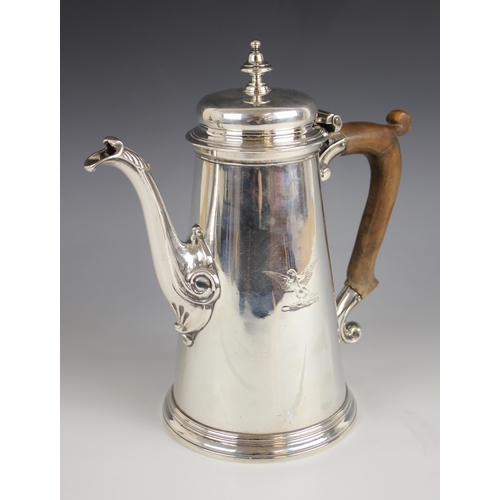 94 - A George II silver coffee pot, London 1745 (maker's marks worn), of tapering cylindrical form on rai... 