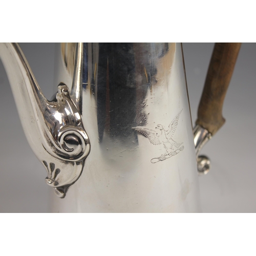 94 - A George II silver coffee pot, London 1745 (maker's marks worn), of tapering cylindrical form on rai... 