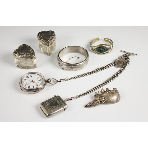 49 - A Victorian silver pocket watch (at fault) upon a silver chain, suspending a silver vesta vase and s... 