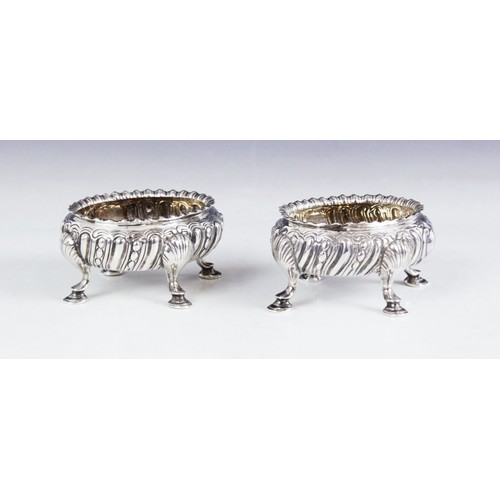 12 - A matched pair of Victorian silver salts, one marked for Daniel & Charles Houle, London 1857, the ot... 