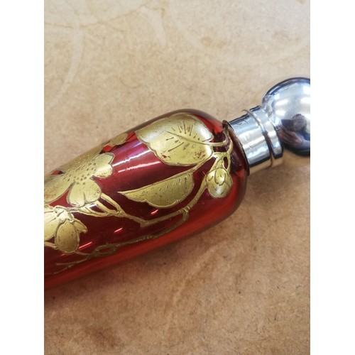 37 - A Victorian cranberry glass, silver mounted scent bottle, the tapered cranberry glass body painted i... 