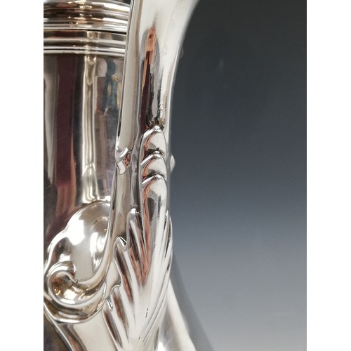 108 - A George III silver coffee pot, London 1764 (maker's marks worn), of baluster form on raised foot, c... 