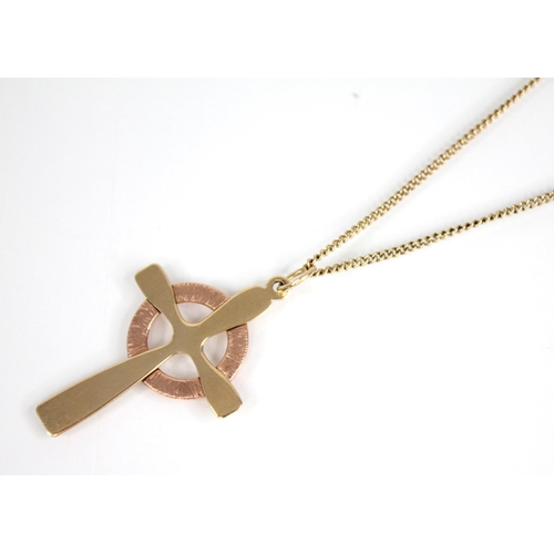 104 - A Clogau 9ct gold cross pendant, in yellow and rose gold hues, 36mm x 23mm, upon a 9ct gold curb lin... 