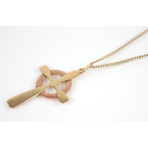 104 - A Clogau 9ct gold cross pendant, in yellow and rose gold hues, 36mm x 23mm, upon a 9ct gold curb lin... 