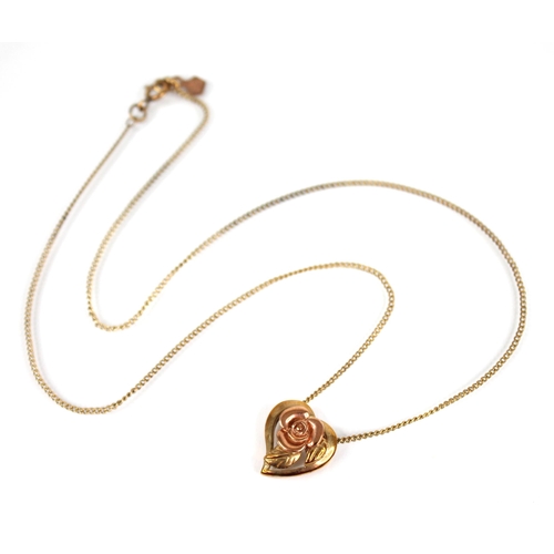 105 - A Clogau 9ct gold heart-shaped pendant, designed as a rose gold flower upon a yellow gold heart-shap... 