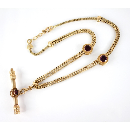 108 - A French 18ct gold garnet set watch key on chain, the double curb-link chain with garnet set bead sl... 