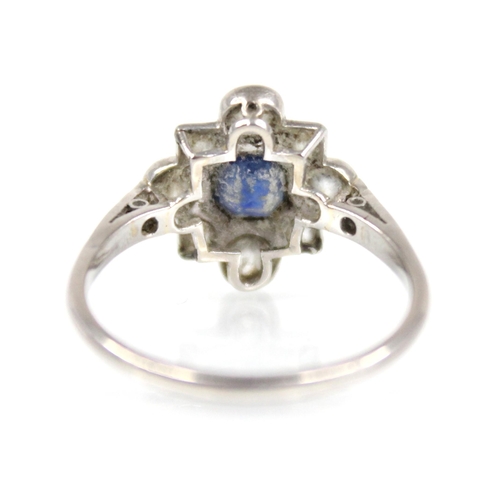 114 - An early 20th century sapphire and diamond transitional ring, the central round mixed cut sapphire m... 