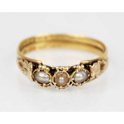 118 - A 19th century pearl set ring, comprising three off-round pearls set to gold coloured beaded borders... 