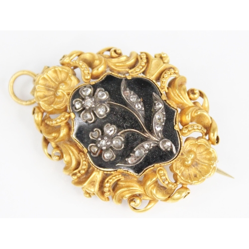 124 - A William IV mourning pendant brooch, the central black enamelled lozenge shaped panel with applied ... 