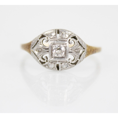 127 - An early 20th century diamond ring, the central old cut diamond measuring 2.8mm x 2.8mm x 1.7mm, set... 