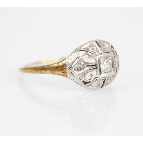 127 - An early 20th century diamond ring, the central old cut diamond measuring 2.8mm x 2.8mm x 1.7mm, set... 