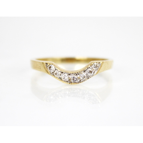 132 - A diamond 18ct gold crescent ring, the arched head set with seven round brilliant cut diamonds, cont... 