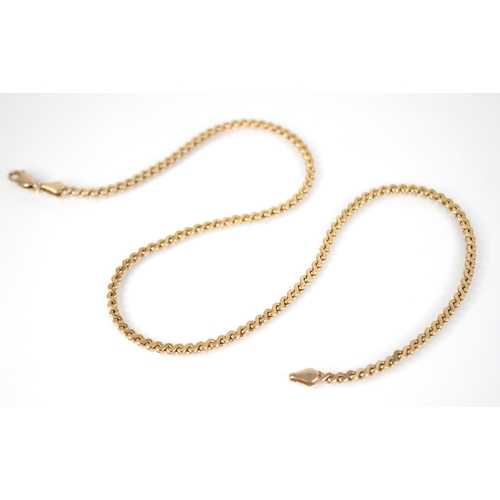 141 - A 9ct gold s-scroll link chain, lobster claw and loop fastening, 39cm long, weight 13.2gms