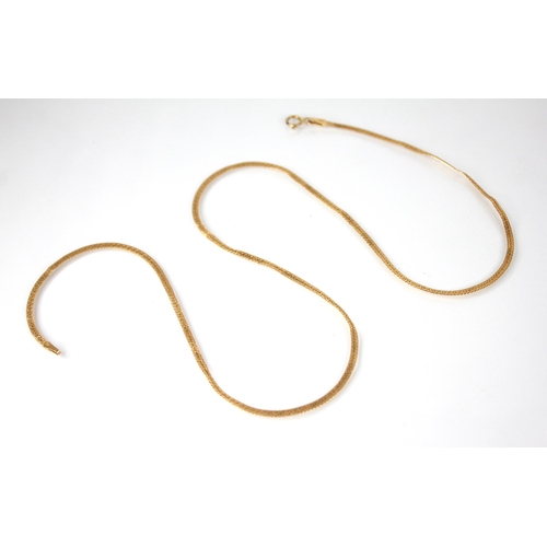 145 - A continental 18ct yellow gold chain, the herringbone link chain with Greek key decoration, spring r... 