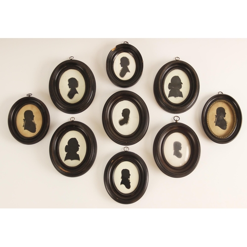 156 - Nine portrait silhouettes, late 18th century, seven on plaster, two on paper, each depicting a membe... 