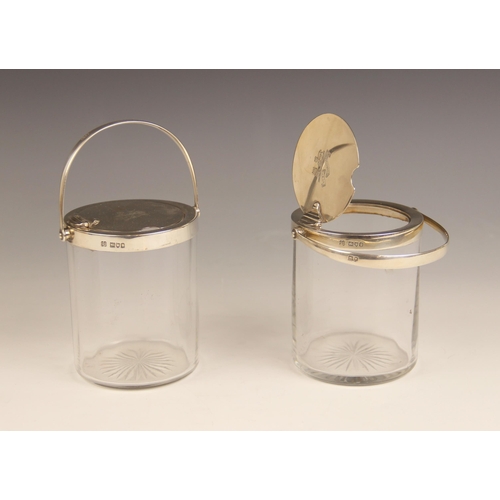 26 - A pair of Edwardian silver mounted cut glass preserve jars, Hukin & Heath, London 1901, each of cyli... 
