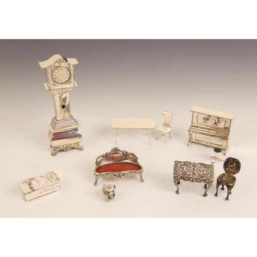 39 - A selection of Dutch silver doll's house furniture, maker's marks for H. Hooykaas, import marks for ... 