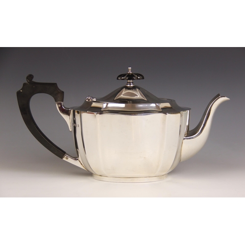 4 - A George V silver tea service, Barker Brothers Silver Ltd, Birmingham 1935, comprising teapot, sucri... 
