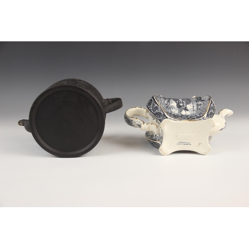 462 - A Wedgwood black basalt teapot and cover, of cylindrical form, the body relief moulded with classica... 