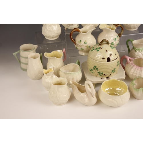 477 - A selection of Belleek porcelain tableware, to include a double spouted milk jug, 19th century, 8.5c... 