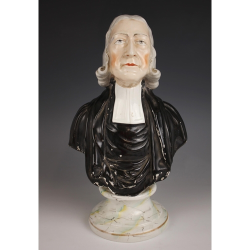 479 - A Staffordshire portrait bust of Reverend John Wesley, mid 19th century, set to an integrated marble... 