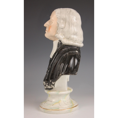 479 - A Staffordshire portrait bust of Reverend John Wesley, mid 19th century, set to an integrated marble... 