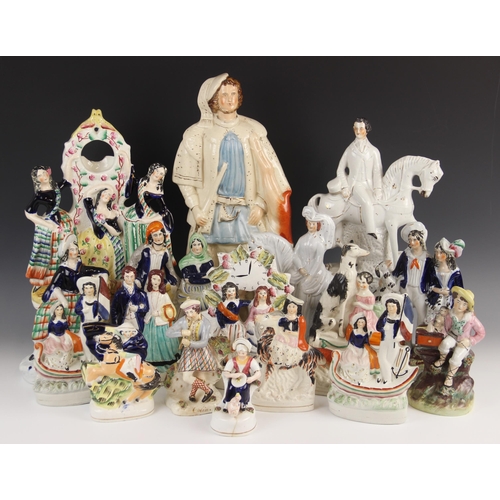 501 - A selection of seventeen Staffordshire flatback figures and figural groups, 19th century, to include... 