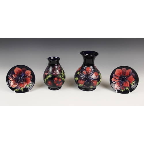 514 - A Moorcroft baluster vase decorated in the Anemone pattern on a cobalt blue ground, impressed maker'... 