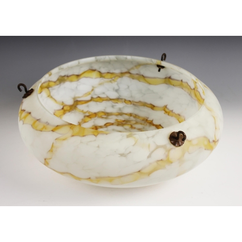 529 - An Art Deco opaque and amber marbled glass plafonnier, early 20th century, of typical form with  han... 