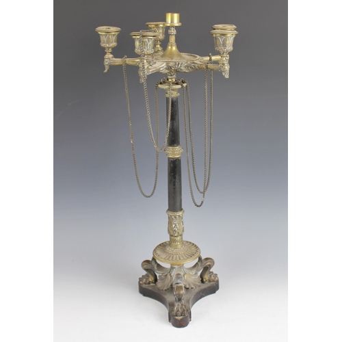 530 - A 19th century polished slate and gilt metal French Empire candelabra, the five cast acanthus sconce... 