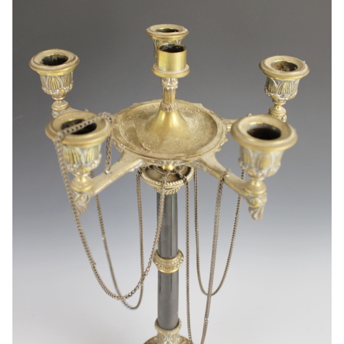 530 - A 19th century polished slate and gilt metal French Empire candelabra, the five cast acanthus sconce... 