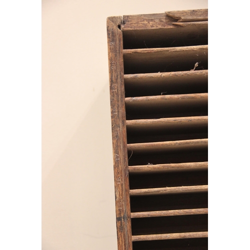 576 - A printers rack by Hampson, Bettridge and Co, London, late 19th/early 20th century, of slatted angul... 