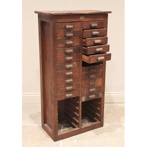 578 - An 'Ullmer' pine printers cabinet, late 19th century, formed from two banks of small drawers applied... 