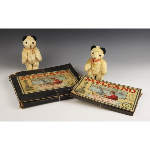 582 - Two vintage Sooty-type wood filled mohair teddy bears, mid 20th century, each with card jointed arms... 