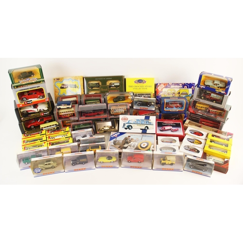 583 - A selection of modern boxed die-cast model vehicles by Corgi, Dinky, Burago and others, to include a... 