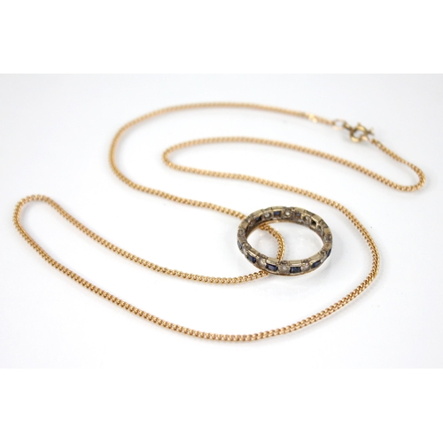 63 - A 9ct gold curb link chain, with spring ring and loop fastening, approximately 51cm long, weight 4.3... 