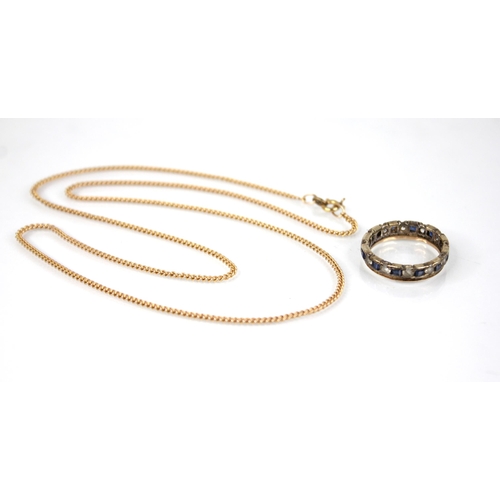 63 - A 9ct gold curb link chain, with spring ring and loop fastening, approximately 51cm long, weight 4.3... 