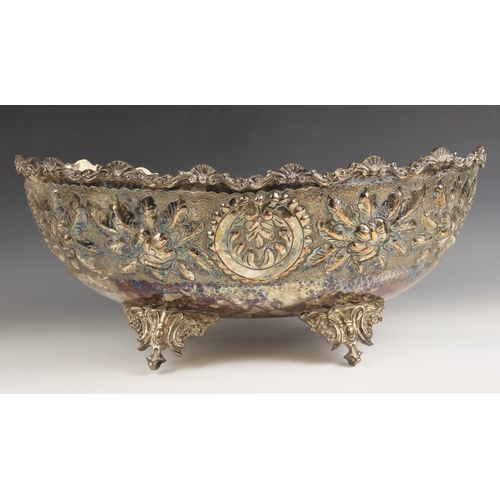 642 - A late 19th century silver plated copper planter, of oval form, with cast shell and scroll border, e... 