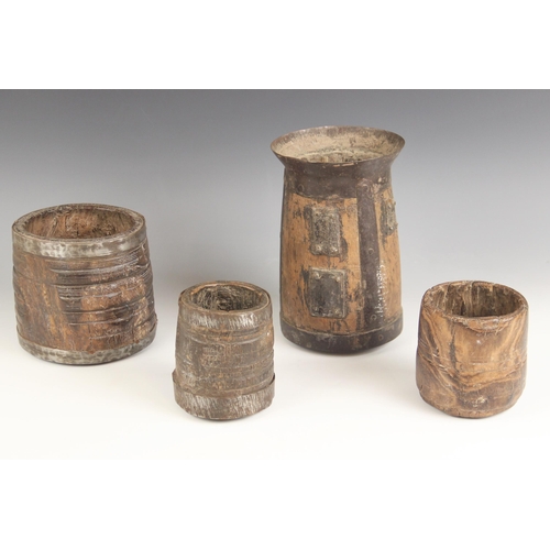 649 - Four 18th century European sycamore and iron bound grain pots, smallest 10cm high and largest 21.5cm... 