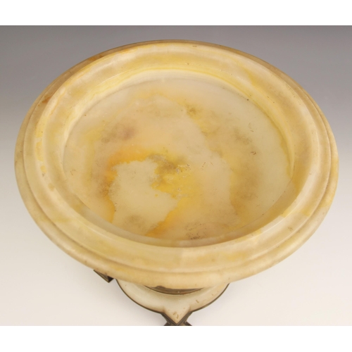 650 - A 19th century continental onyx and enamel brass mounted tazza, of circular form with ogee rim, rais... 