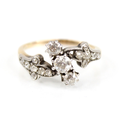 66 - A Victorian diamond foliate ring, comprising a central old cut diamond measuring approximately 3.75m... 