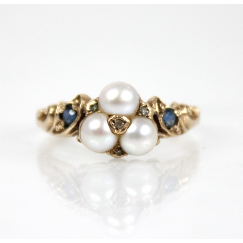 67 - A Victorian style pearl, diamond and sapphire 9ct gold ring, the floral head comprising three mabe p... 