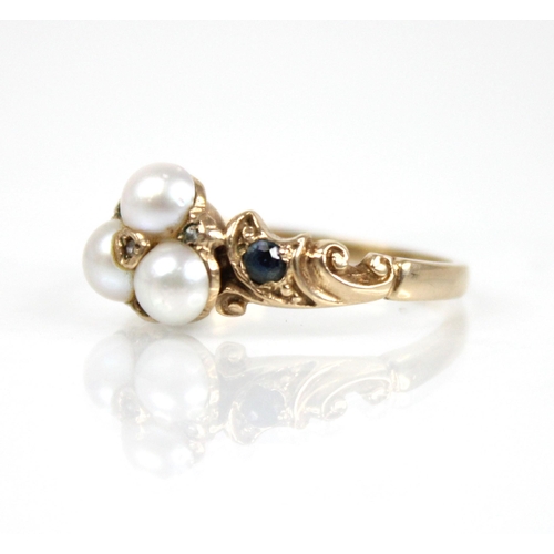 67 - A Victorian style pearl, diamond and sapphire 9ct gold ring, the floral head comprising three mabe p... 