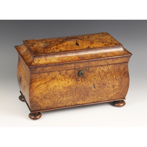 671 - A pollard oak sarcophagus shaped tea caddy, mid 19th century, the velvet lined hinged cover enclosin... 