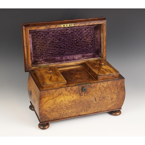 671 - A pollard oak sarcophagus shaped tea caddy, mid 19th century, the velvet lined hinged cover enclosin... 